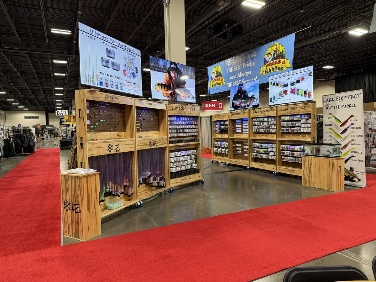 Lake Effect booth with a red carpet aisle and wall displays